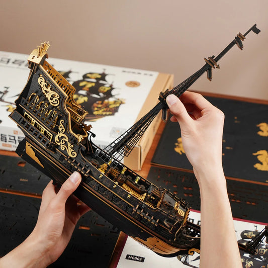 A professional close-up of the completed ROKR Seahorse Barque pre-colored 3D wooden puzzle, showcasing intricate baroque details and gold accents.