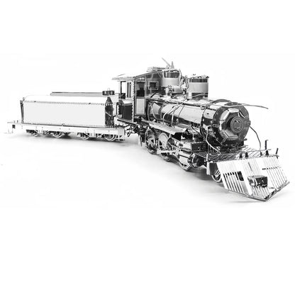 A finished stainless steel 3D metal puzzle of a classic steam locomotive with intricate gear and wheel details, shining under a desk lamp.