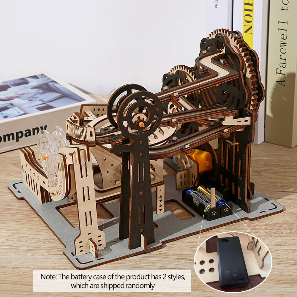 A completed mechanical marble run 3D wooden puzzle with intricate gears and steel marbles, showcasing kinetic engineering in a professional home office setting.