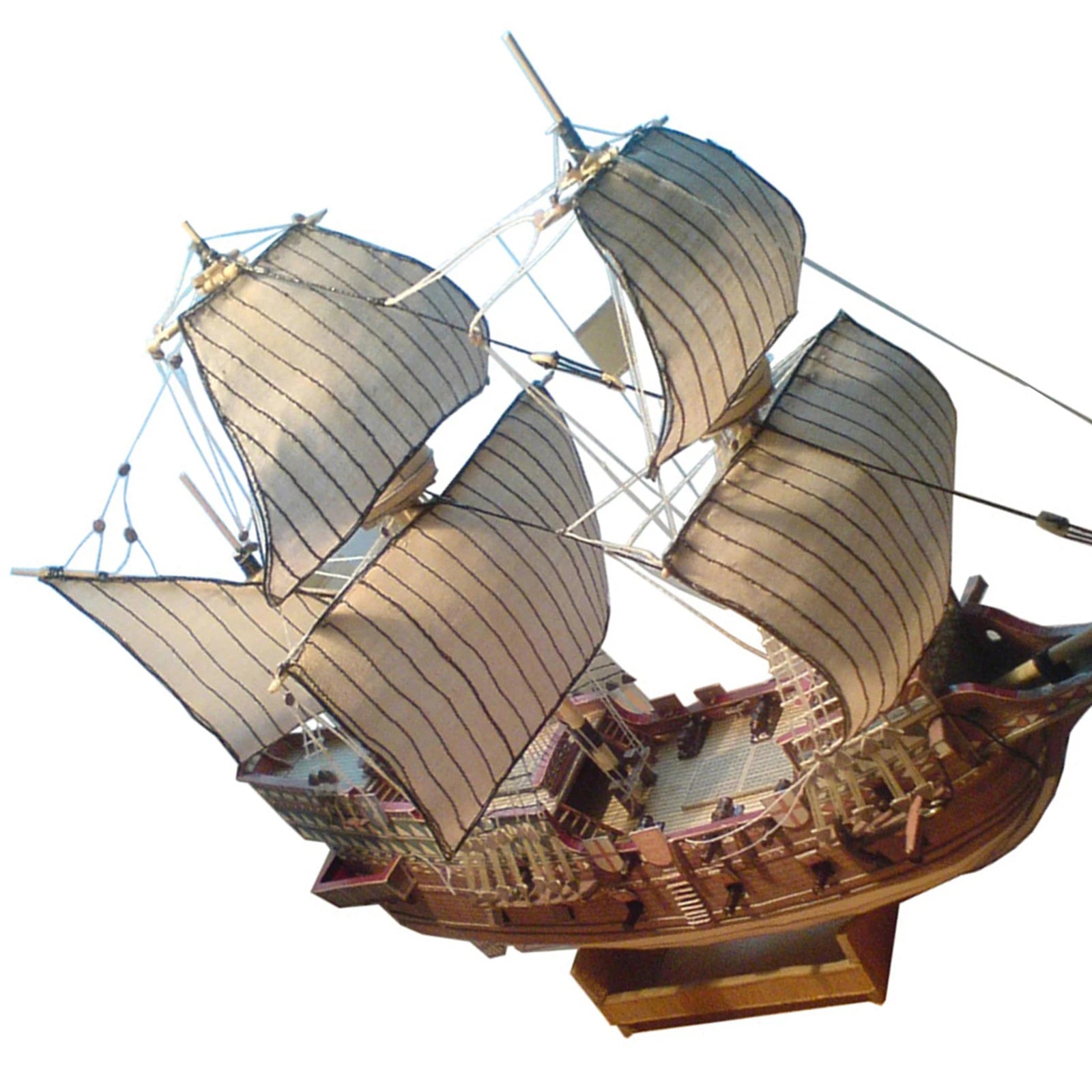 A professional completed paper model of the Golden Hind galeon at 1:100 scale, showcasing realistic paper textures and historical naval rigging.